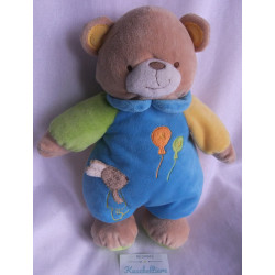 Maximo - Spieltier Kuscheltier Bär mit Rasselgeräusch - blau, gelb,...
